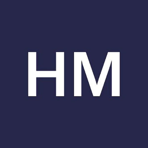 The image displays the letters "HM" in white on a dark blue background.